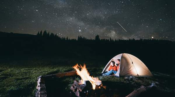 Editorial illustration for How to Choose a Camping Headlamp: Match Lumens, Beam, and Battery to Your Activity